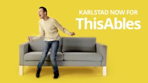 Image of Eldar Yusupev, a thin man in a cream sweater and jeans standing in front of a couch. Yellow background with white text reads ThisAbles