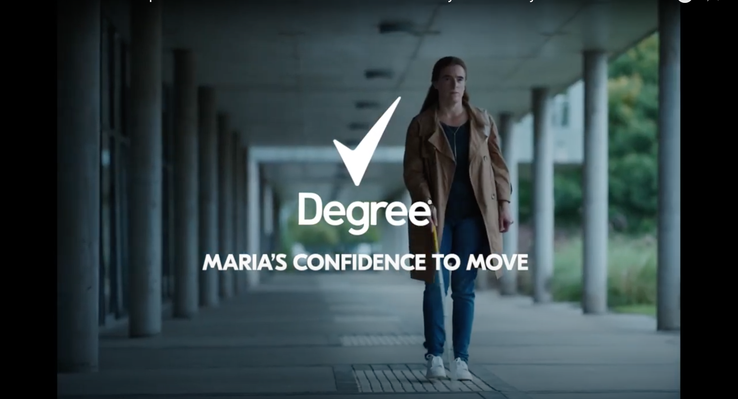 Maria, a white woman using a white cane in a trench coat text on the screen says Degree Maria's Confidence to Move
